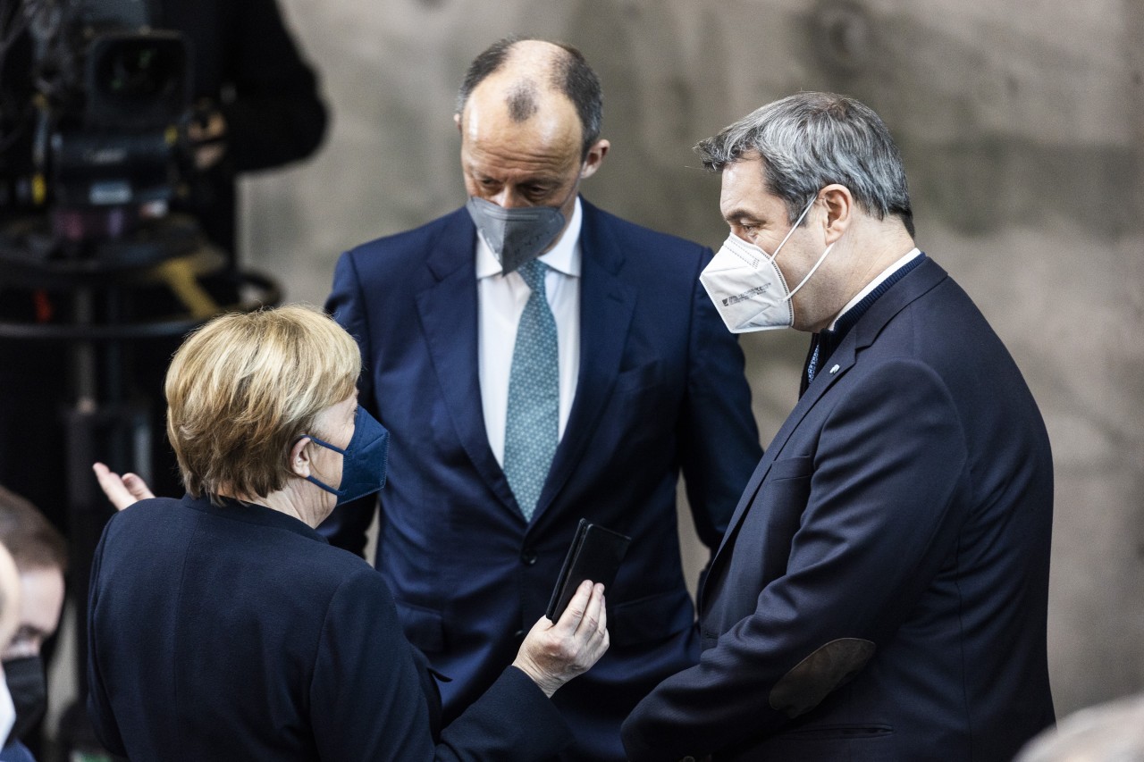 Trafen auf der Bundesversammlung aufeinander: Altkanzlerin Angela Merkel, CDU-Chef Friedrich Merz und CSU-Boss Markus Söder. 