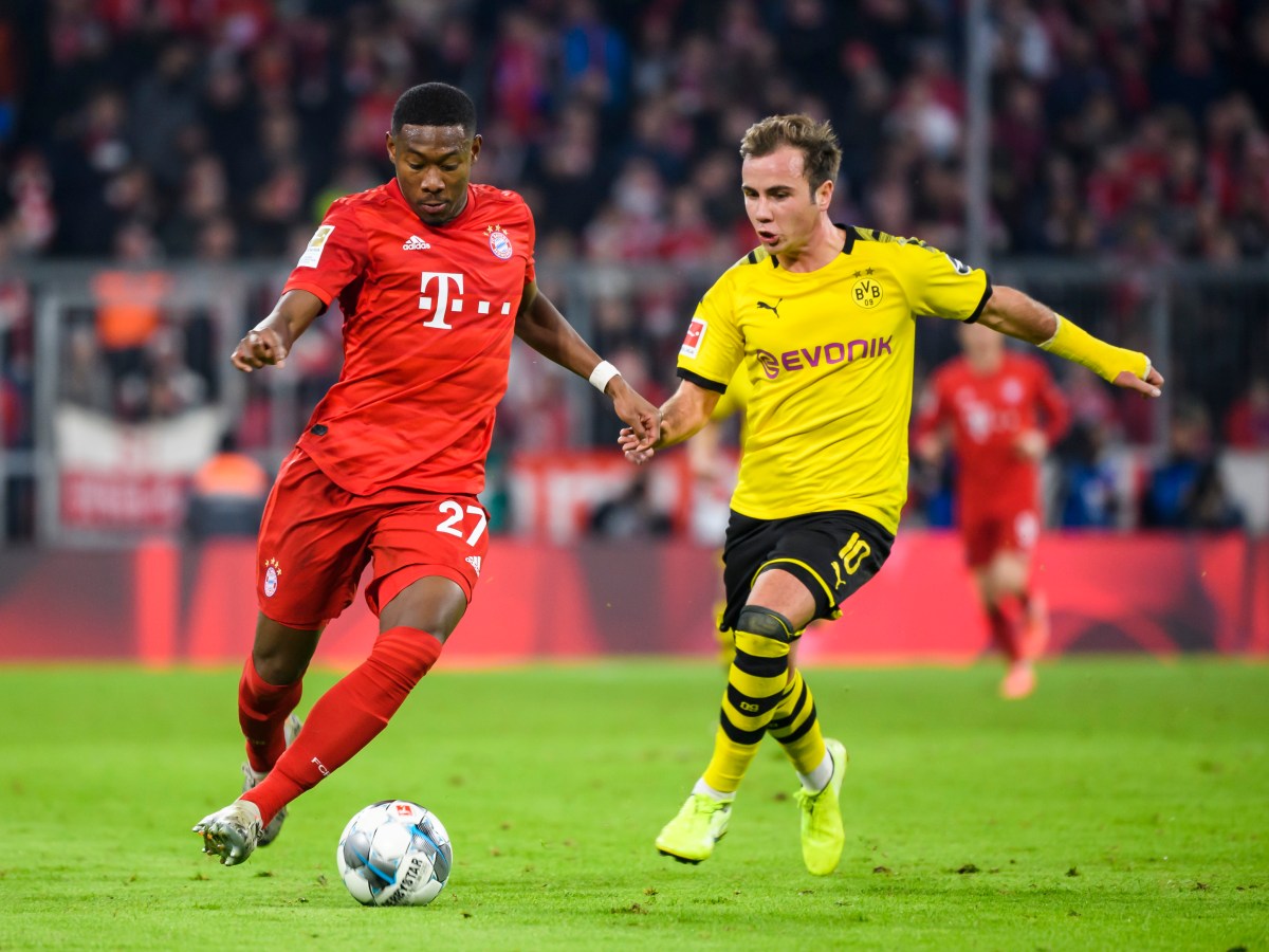 Mario Götze beim BVB im Duell mit David Alaba beim FC Bayern München